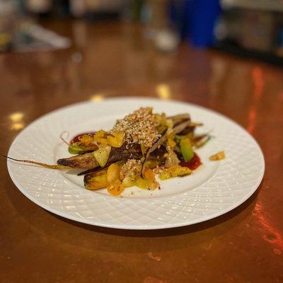 heirloom carrots with hemp seed + brazil nut crumble, gochujung + marinated kumquats