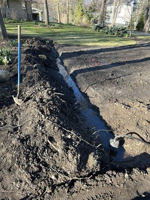 Drain tile installed along street connecting up to my house