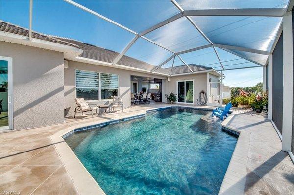 Outdoor living at its finest. Large lanai and a detached guest suite by the pool.