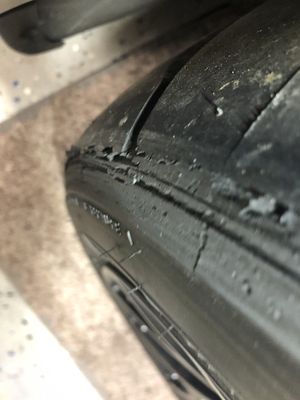 Rear Tire edge of tread cut to shreds - same on both sides