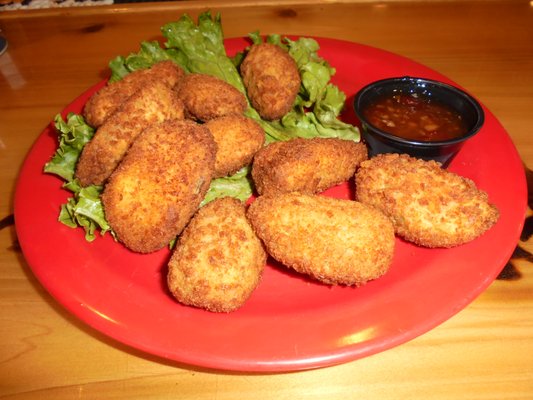 Jalapeno poppers with dipping sauce.