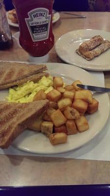 Home fries, eggs, toast, and french toast!