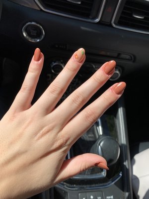 Very pleased with my experience at Luxury Nails. Will definitely be coming back. "Burnt orange" with nude pop nail!