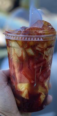 Fruit cup with watermelon, pineapple, cucumber, mango, cantaloupe, chamoy and chili (powder Lucas)