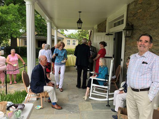 Coffee hour on the porch of the Parish House.