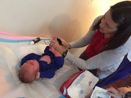 Baby footprints are one of the many sweet moments shared between new families and their midwife.