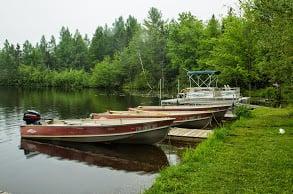 Row boats included with cabin. Motors, pontoon, canoe, and kayaks available for rental