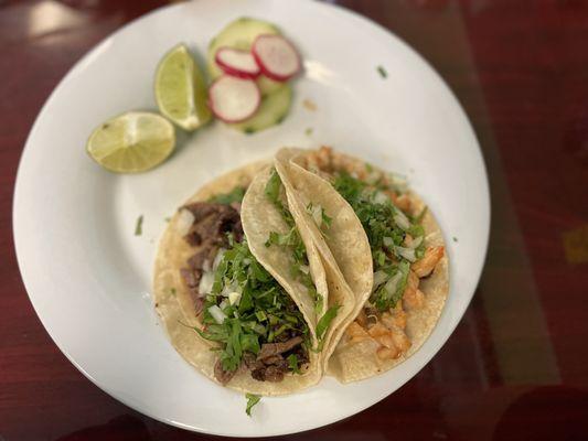 Carne asada (beef) and pollo (chicken) tacos