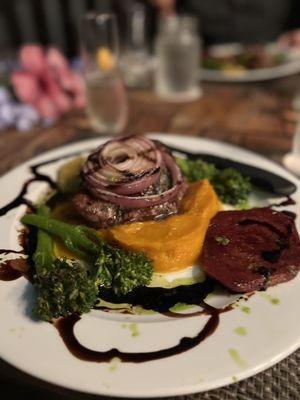 Grilled sirloin with clarified lavender cracked black pepper butter, Kabocha squash, red beets, roasted broccoli