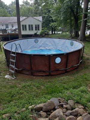 Brand new above ground swimming pool assembled.