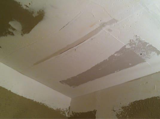 The "finished job" maintenance did.  You can see the ceiling is still cracked & the roof fell down again 1 day later