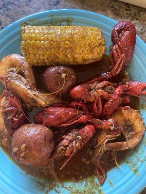 Crawfish/shrimp boil with special seasoning. AMAZING!!