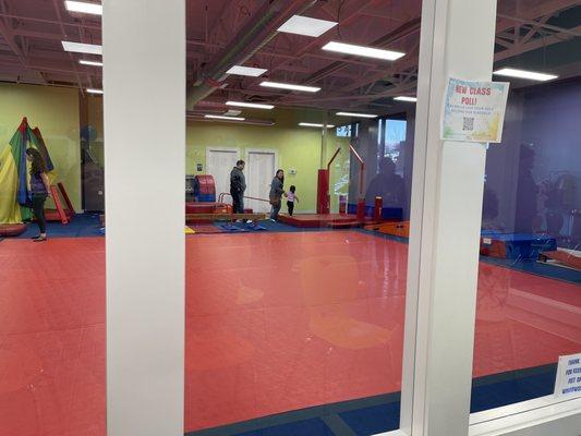 View from inside the party room looking into the gym area.