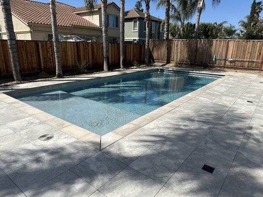 Porcelain pool deck, auto cover, lap pool