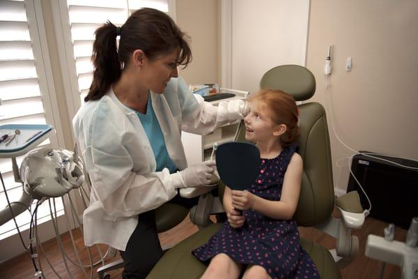 We take care of the entire family, from first tooth to first dental  implant.