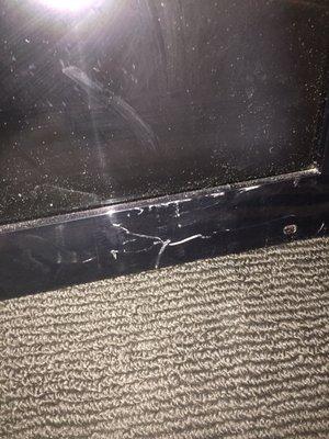 Scratched TV. This was actually placed face down on a dog crate by Charles' moving team. Unreal