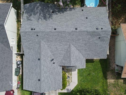 An older home with a brand new roof installed.