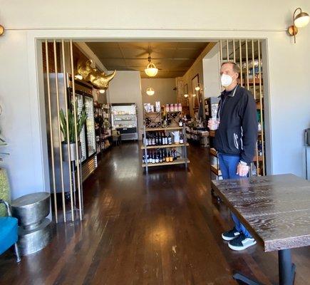 Chic upscale deli has replaced the former sit-down dining area. (Husband for scale.)