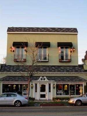 the studio is upstairs, right above the Diane Merrick Clothing Salon