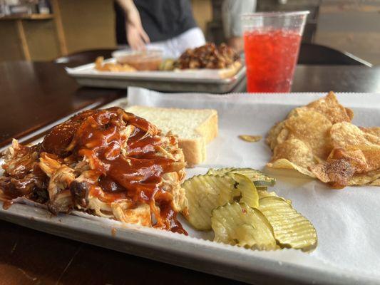 Here's the Pulled Pork Plate, pickle slices and a small portion of Broad Ripple chips