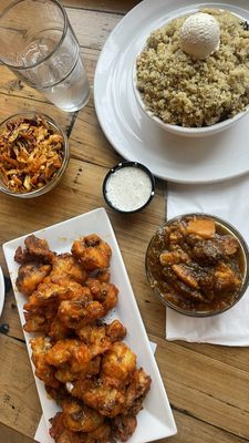 Buffalo cauliflower wings, coleslaw, yams, and cornbread, collard greens and mac & cheese combo.