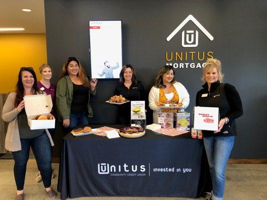 It's Be Happier Hour every quarter at the branch. Celebrating National Donut Day with our members.