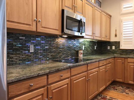 Glass mosaic kitchen backsplash.