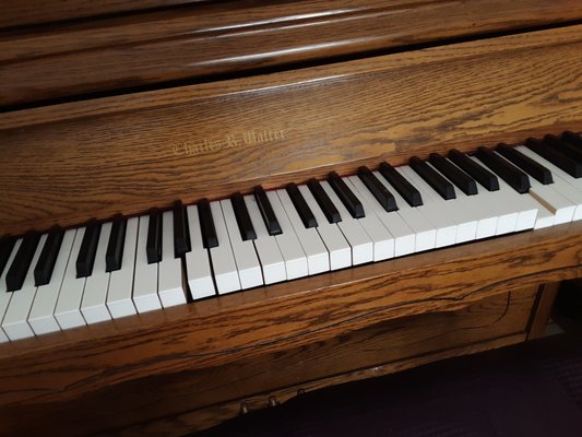 damaged piano from dropping of jostling