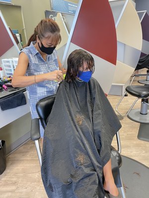 Almost 7yo getting haircut