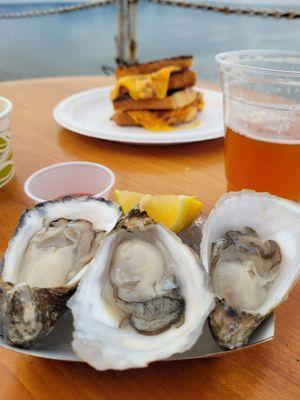 Oyster happy place, pig and fig in the background