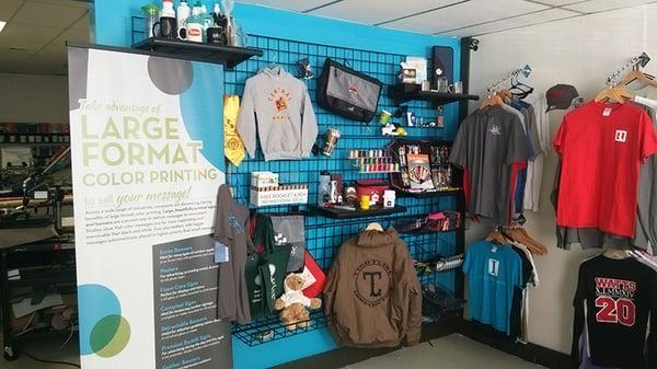 Shop view of screen printing, embroidery, promotional items and wide format.