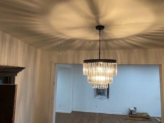 Dining area chandelier light fixture installed