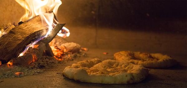 pizzas cook right on the oven floor in about 2-3 minutes.