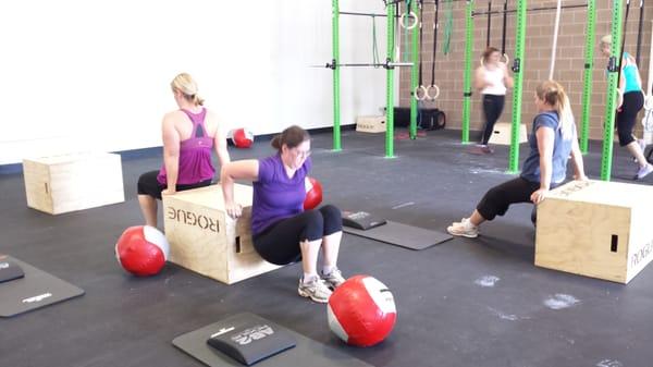 CrossFit is a social workout that helps you push hard and achieve awesome results.