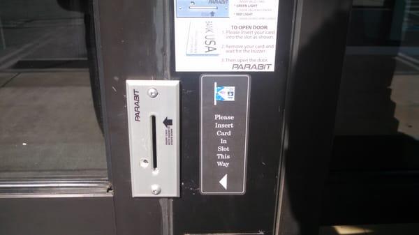 Here's how to access the ATM when the branch is closed, swipe your card in the "door-hinge looking" thing on the right door.