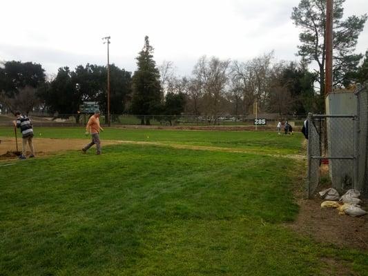 Getting the field ready for opening day in 2013