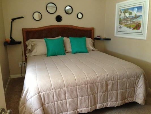 King size bed with full size closet and flat screen in rental 105