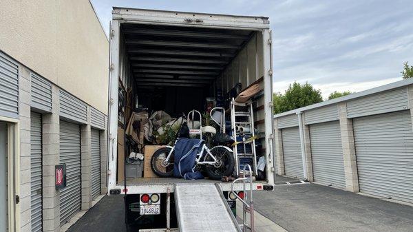 One stop at a storage unit to pick up a bed!