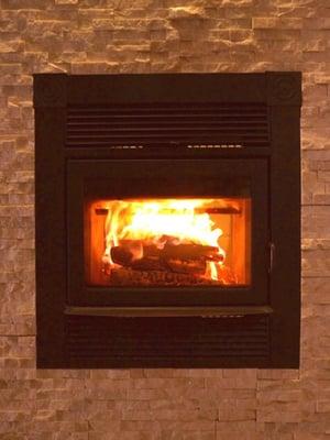 Supreme Opus see-thru high efficiency fireplace--this fireplace looks beautiful AND heats 1500 square feet!