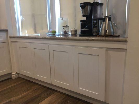 Custom coffee bar made with semi -custom cabients.