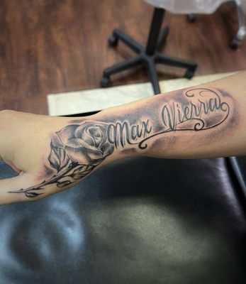 Rose/name tattoo