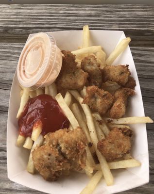 Gator bites& fries..and that sauce is so good, perfect for these gator bites& dip your fries in also..