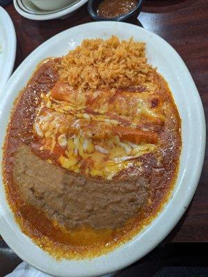 El Loco plate one beef and one cheese enchilada two tacos and one tostada with rice and beans