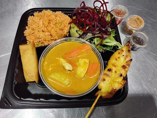 C-Yellow Curry Chicken with chicken satay and egg roll.