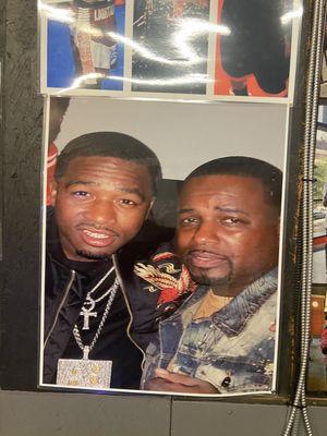 Coach has pics on wall with many boxer such as Adrian Broner