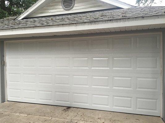 A 16 x 7 garage door installed in DeLand, Florida by American Overhead Garage Door.