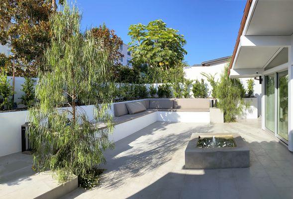 LIMESTONE COURTYARD, BUILT-IN BENCH AND FOUNTAIN IN PALOS VERDES ESTATES