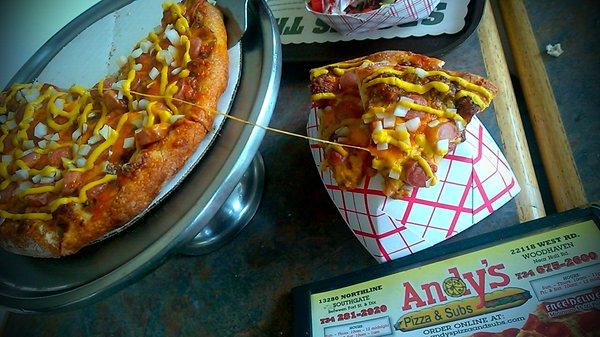 Love  a great Cheddar Cheese pull. Coney Dog Pizza  rules Delicious