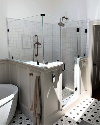 Our shower glass in their simple elegant bathroom. One of my favorites