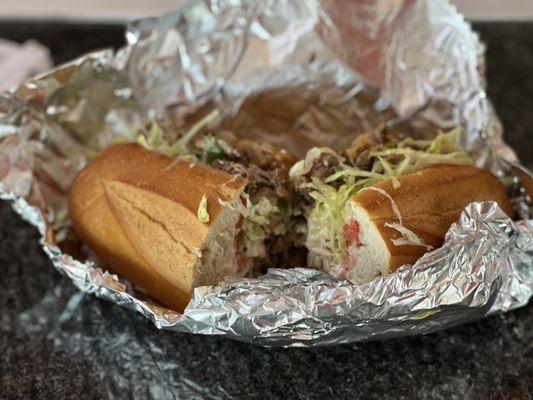 Bread was excellent- steak is sliced fresh and they are not cheap ... lunch and dinner in one hoagie.